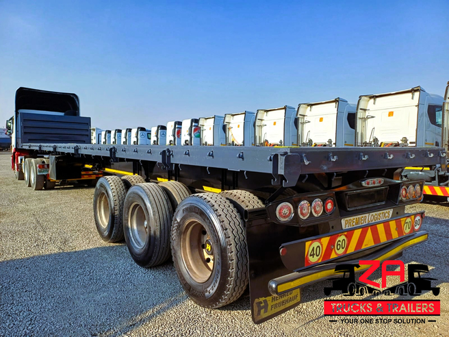 2023 HENRED FRUEHAUF TRI-AXLE FLAT DECK